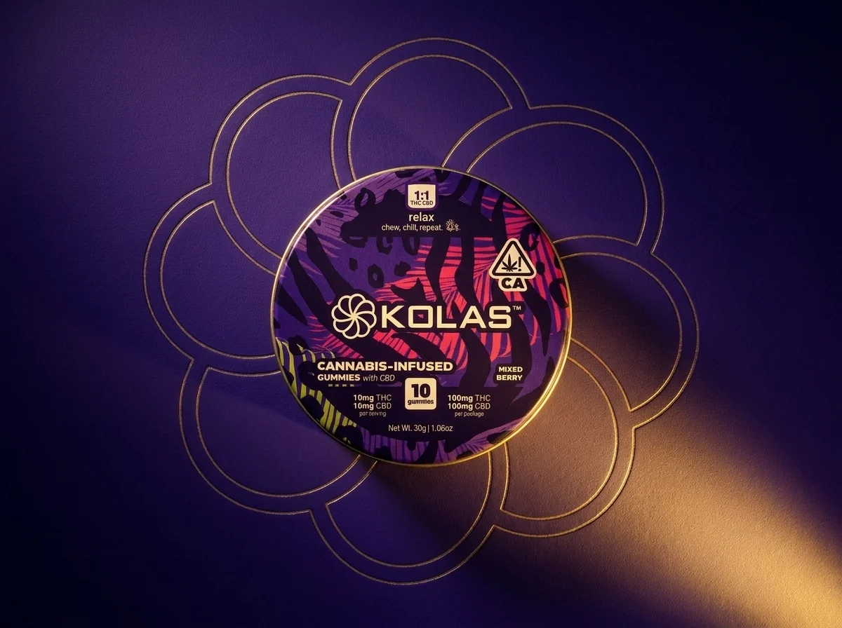 A round KOLAS cannabis-infused gummies tin, 1:1 THC and CBD, top-down on a deep purple surface under a raking gold light