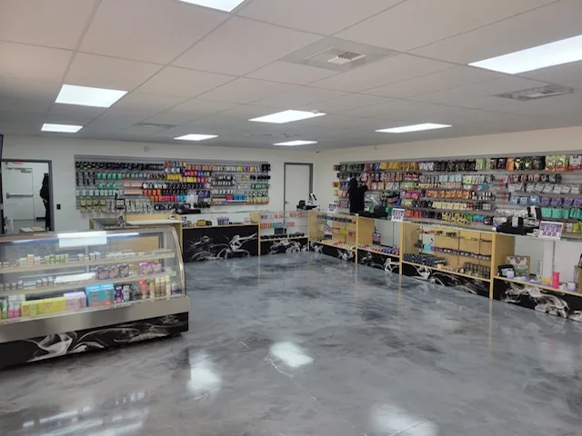 The Fruitridge sales floor: display cases on a polished floor and product walls